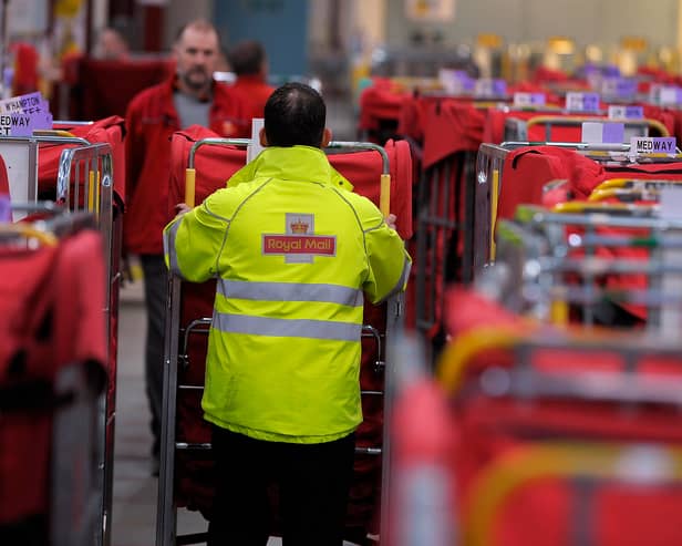 Royal Mail's six-day-a-week letter deliveries could be cut to three or five days per week after regulator Ofcom said that the service was "unsustainable". (Credit: Getty Images) 