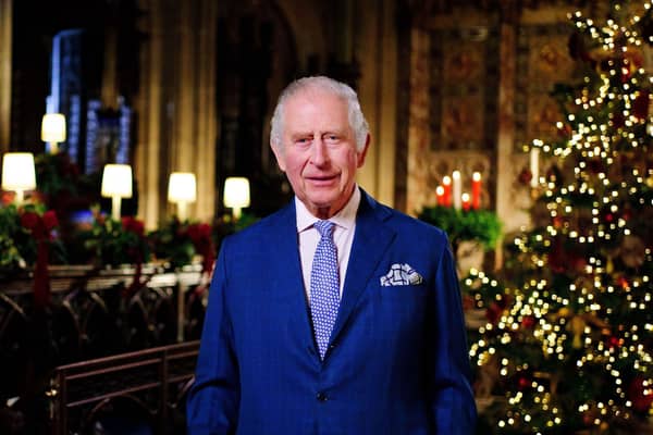 King Charles III is seen during the recording of his first Christmas broadcast in the Quire of St George's Chapel at Windsor Castle, on December 13, 2022