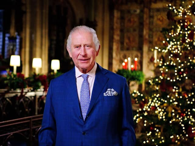 King Charles III is seen during the recording of his first Christmas broadcast in the Quire of St George's Chapel at Windsor Castle, on December 13, 2022