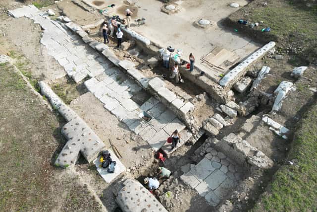 Drone view of excavation of the two footpaths lining the street separating the basilica top from the theatre bottom (Alessandro Launaro / SWNS)