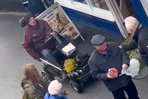 Shocking moment a pensioner on a mobility scooter knocks down another elderly man during a row about a pasty in Devon. Picture: Oakleigh Richards / SWNS