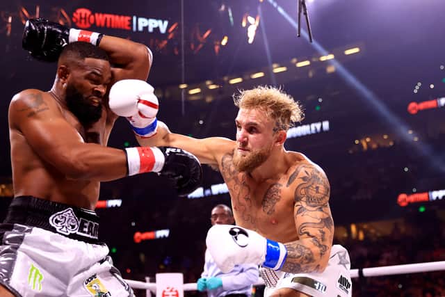 Jake Paul fights Tyron Woodley during a rematch of an eight-round cruiserweight bout at the Amalie Arena on December 18, 2021 in Tampa, Florida