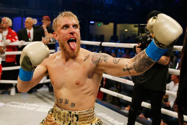 Jake Paul celebrates after defeating AnEsonGib in a first round knockout during their fight at Meridian at Island Gardens on January 30, 2020 in Miami, Florida.