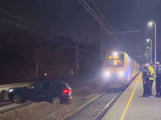 A quick-thinking train driver narrowly avoided a major "catastrophe" after a motorist crashed onto railway tracks. Aytam El Ghandour / SWNS