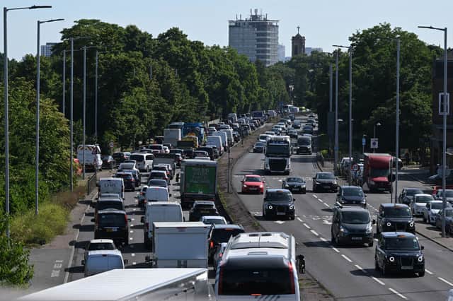 Cars queue in traffic in Hammersmith (Image: JUSTIN TALLIS/AFP via Getty Images)