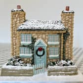 A cake made by Bridie West, a cake baker from Essex, has gone viral on TikTok after making an "entirely edible" version of Rosehill cottage from the Christmas film The Holiday. Photo by Bridie West/PA Wire.