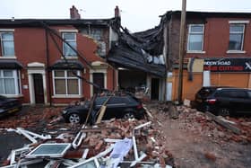 Two people were hospitalised after a suspected gas explosion at a home in Blackburn. (Credit: Paul Currie/PA Wire)