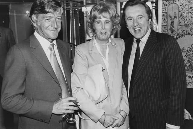 Television personality Michael Parkinson (left) and journalist David Frost pictured with Lady Marcia Falkender at a Foyles luncheon for the release of David Frost's book 'I Could Have Kicked Myself', at the Dorchester Hotel in London, May 18th 1982. (Photo by Central Press/Hulton Archive/Getty Images)