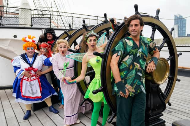 Shaun Williamson as Hook (back) and James Argent as Peter Pan (right) joining other cast members for a photocall on board HMS Warrior at Portsmouth Historic Dockyard (Photo: Andrew Matthews/PA Wire)