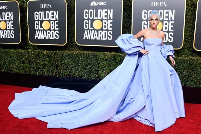 For the 2019 Golden Globes, Lady Gaga wore a powder blue Valentino dress and matched her hair to her gown.  (Photo by Frazer Harrison/Getty Images)