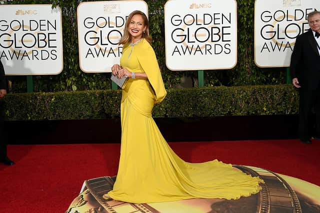 Jennifer Lopez wowed in a canary yellow Giambattista Valli‎ gown for the 2016 Golden Globes. Photograph by Getty