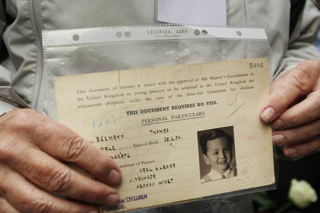 An evacuee saved by Winton holds their original identity card