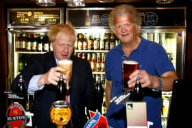Tim Martin with Boris Johnson in 2019. Credit: Getty