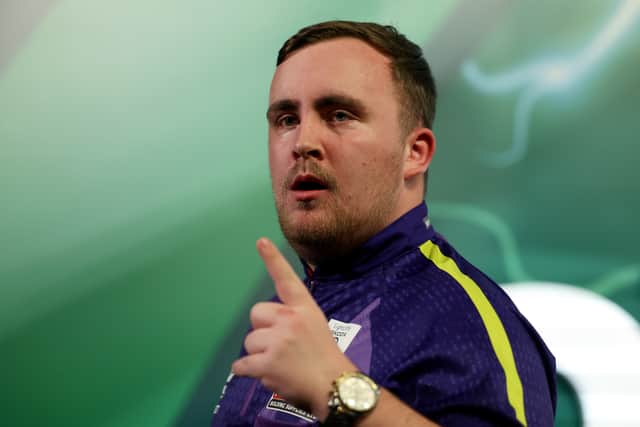 Luke Littler of England celebrates during his round four match against Raymond van Barneveld of Netherlands on day 13 of the 2023/24 Paddy Power World Darts Championship at Alexandra Palace on December 30, 2023 in London, England. (Photo by Tom Dulat/Getty Images)