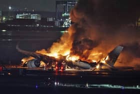 Five crew members have been found dead following a collision between two planes in Tokyo