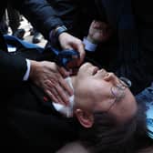 South Korea opposition leader, Lee Jae-myung, was stabbed in the neck by an unidentified man as he walked through a crowd of journalists during a visit to Busan. (Photo: The Busan Daily News via Getty Images)