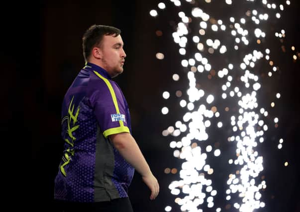 Luke Littler, who turns 17 on January 21, is one step closer to winning the PDC World Darts Championship (Photo by Tom Dulat/Getty Images)
