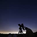 Members of the York Astronomical Society prepare to view the annual Perseids meteor shower in August 2015 (Photo: OLI SCARFF/AFP via Getty Images)