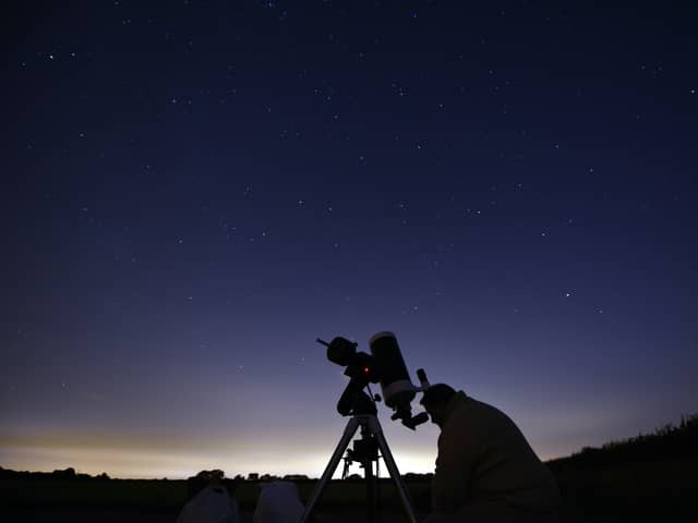 Members of the York Astronomical Society prepare to view the annual Perseids meteor shower in August 2015 (Photo: OLI SCARFF/AFP via Getty Images)