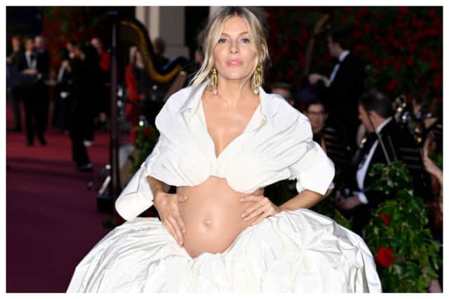 Sienna Miller has given birth to a baby daugher with Oli Green. Here she is upon arrival at the "Vogue World: London" event at the Theatre Royal Drury Lane in central London on the eve of London Fashion Week on September 14, 2023. (Photo by HENRY NICHOLLS / AFP) (Photo by HENRY NICHOLLS/AFP via Getty Images)