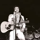 Elvis Presley performs in concert at the Milwaukee Arena on April 27, 1977 in Milwaukee, Wisconsin. Picture: Getty Images