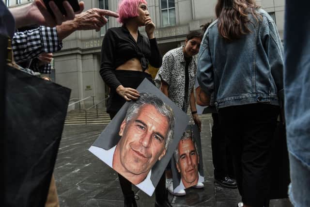 Jeffrey Epstein never married and reportedly had no children. A protest group called "Hot Mess" hold up signs of Jeffrey Epstein in front of the Federal courthouse on July 8, 2019 in New York City Picture:  Stephanie Keith/Getty Images
