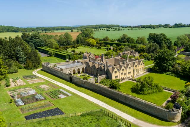 Aerial view of grade I historic 14th century Hazelbury Manor and it's 181-acre grounds in Wiltshire