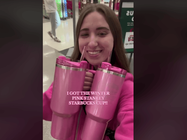 A limited edition pink Starbucks x Stanley Valentine's Day cup has been released. Pictured is TikTok user @whoslulugirl_2 with her cups. Photo by TikTok/@whoslulugirl_2.