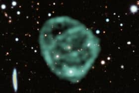Researchers shared the first image of an odd radio circle, captured by the MeerKAT radio telescope, in 2022. (Image: J. English (U. Manitoba)/EMU/MeerKAT/DES (CTIO))