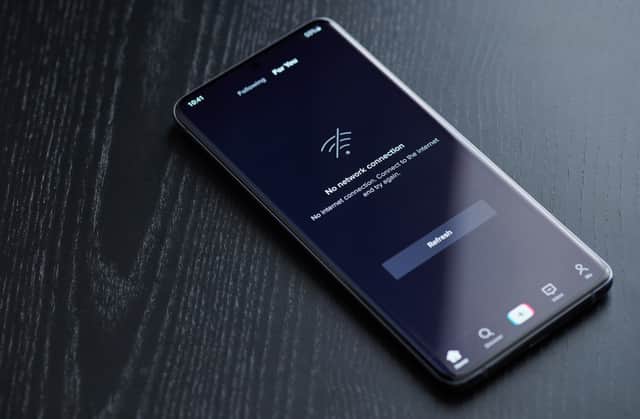 TikTok users have been left baffled by a "no internet connection" error - here's seven ways to fix it. Image by Adobe Photos.