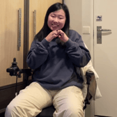 Amanda Tam has a neurological disorder ALS and uses "dark humour" to inform her TikTok followers about it. Photo by TikTok/@AmandaTam00