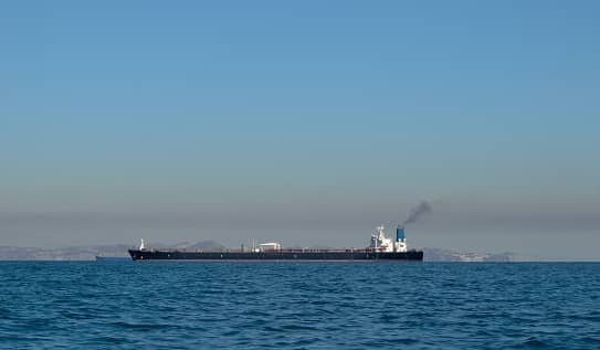 Large oil tanker ship smoking sails Strait of Hormuz, Persian Gulf, Iran. Picture: Getty images