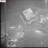 This dramatic image shows a HGV crashed into a barrier on the M6 with the collision causing tailbacks. (credit: National Highways)