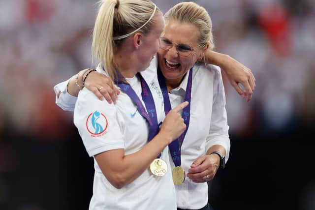 Beth Mead celebrates with Wiegman following the Euros win