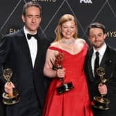 British actor Matthew Macfadyen, winner of Best Supporting Actor in a Drama Series, Australian actress Sarah Snook, winner of Best Actress in a Drama Series and US actor Kieran Culkin, winner of Best Actor in a Drama Series for "Succession" pose in the press room during the 75th Emmy Awards at the Peacock Theatre at L.A. Live in Los Angeles on January 15, 2024. (Photo by Robyn BECK / AFP)