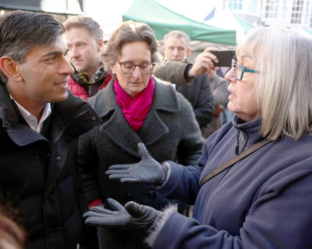 Prime Minister Rishi Sunak is challenged by a member of the public over the NHS crisis. Credit: Dan Kitwood/PA Wire