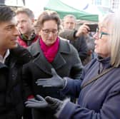 Prime Minister Rishi Sunak is challenged by a member of the public over the NHS crisis. Credit: Dan Kitwood/PA Wire