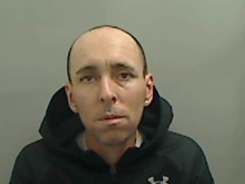 Sean Marshall, who was found hiding in a cupboard wearing tights over his head, has been sentenced to over four years in prison. 