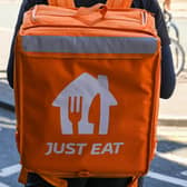 Online food order and delivery platform Just Eat Takeaway will close its in-house delivery service in a major city. Stock image by Adobe Photos.