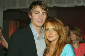 It may have been 20 years since Jonathan Bennett and Lindsay Lohan (pictured) graced our screens as high school couple Aaron Samuels and Cady Heron, but in 2024 the cult film is still influencing the way we date. Photo by Getty Images.