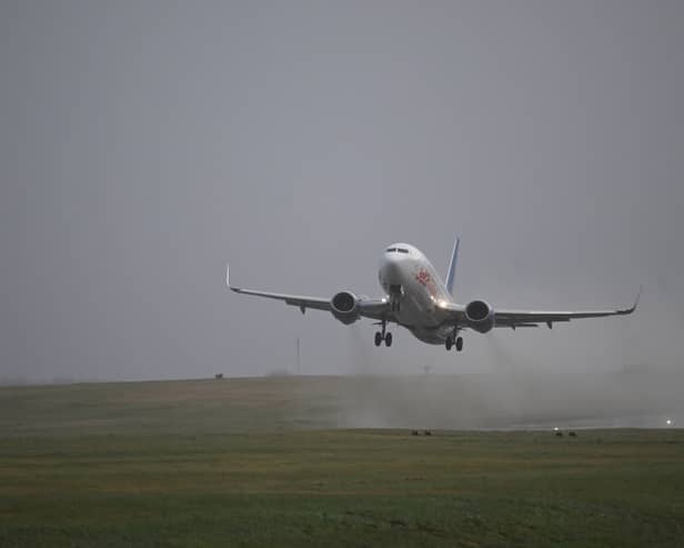 An updated list of affected departures and arrivals at airports including Edinburgh, Gatwick, and Heathrow amid Storm Jocelyn. (Photo: AFP via Getty Images)
