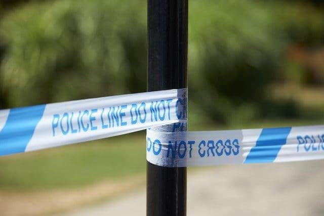 A man has died following an altercation at a A34 Kingsway traffic light in Manchester