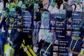 A live demonstration uses artificial intelligence and facial recognition in a dense crowd at CES 2019 (Photo: DAVID MCNEW/AFP via Getty Images)