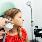 Earwax removal has traditionally been available on the NHS via GP surgeries. (Picture: Adobe Stock)