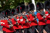 Members of the Coldstream Guards, a regiment of Household Division, march to Horseguards parade Picture: Niklas Halle'n /AFP via Getty Images)