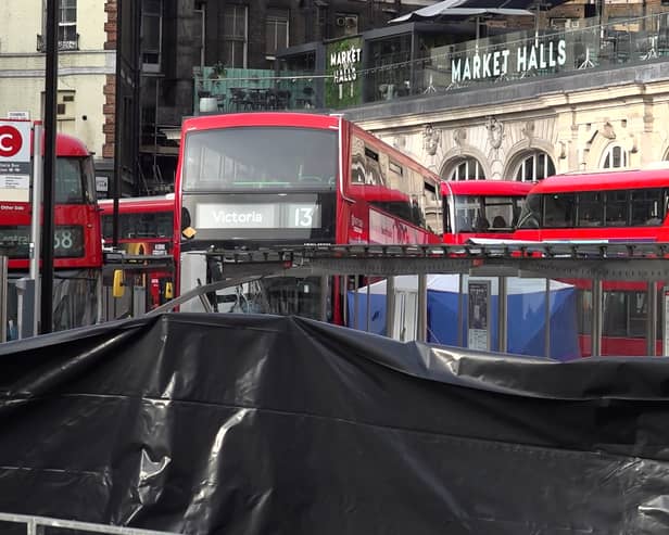 A pedestrian has died after being struck by a bus outside London Victoria station. (Credit: Jamie Lashmar/PA Wire)