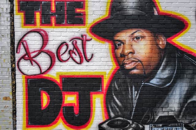 A mural paying tribute to late Run-DMC's Jam Master Jay is pictured in the Hollis neighborhood of the Queens borough of New York on January 29, 2024. (Photo by Charly TRIBALLEAU / AFP)