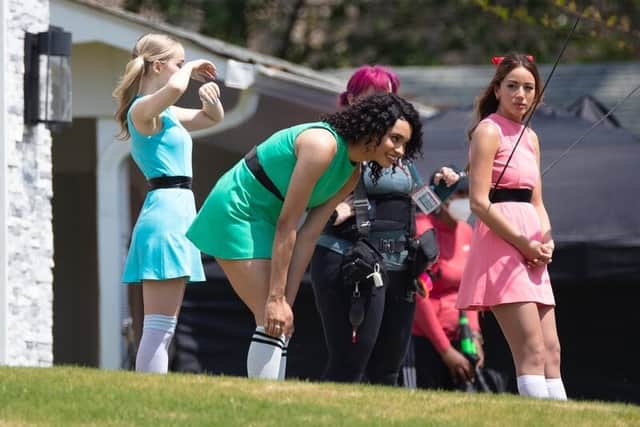 Chloe Bennet, Dove Cameron and Yana Perrault filming scenes from the cancelled "Powerpuff" reboot (Credit: The CW)