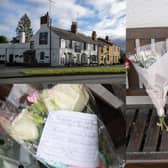 Floral tributes have been laid at the Three Horse Shoes pub in Oulton (Photo by Tony Johnson/National World)