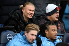 Erling Haaland ooks on from the from the substitutes bench prior to the Emirates FA Cup Third Round match between Manchester City and Huddersfield Town at Etihad Stadium on 7 January 2024 (Photo: Gareth Copley/Getty Images)